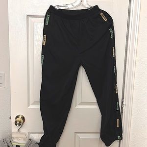 Mid-rise ankle pants, color black, size of M/L